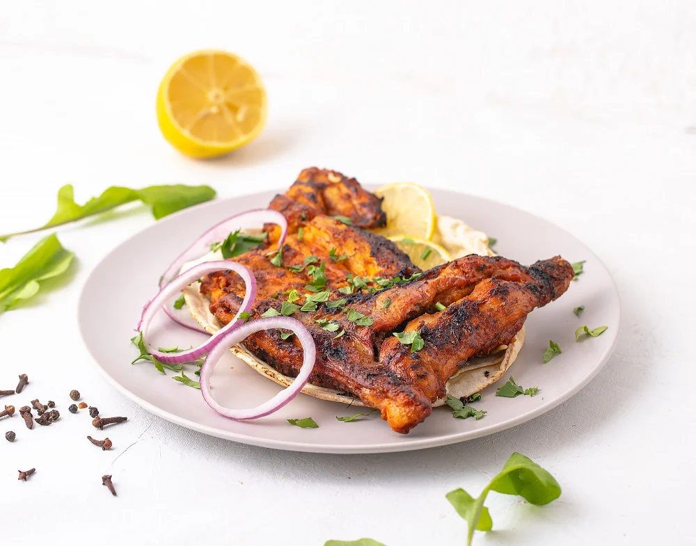 نصف دجاجة مشوية